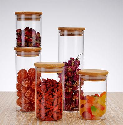 ODM / OEM personnalisé Elegant maison rond pot de stockage en verre 8oz 26oz pot de stockage alimentaire en verre avec couvercle étanche en bambou Design élégant et pratique